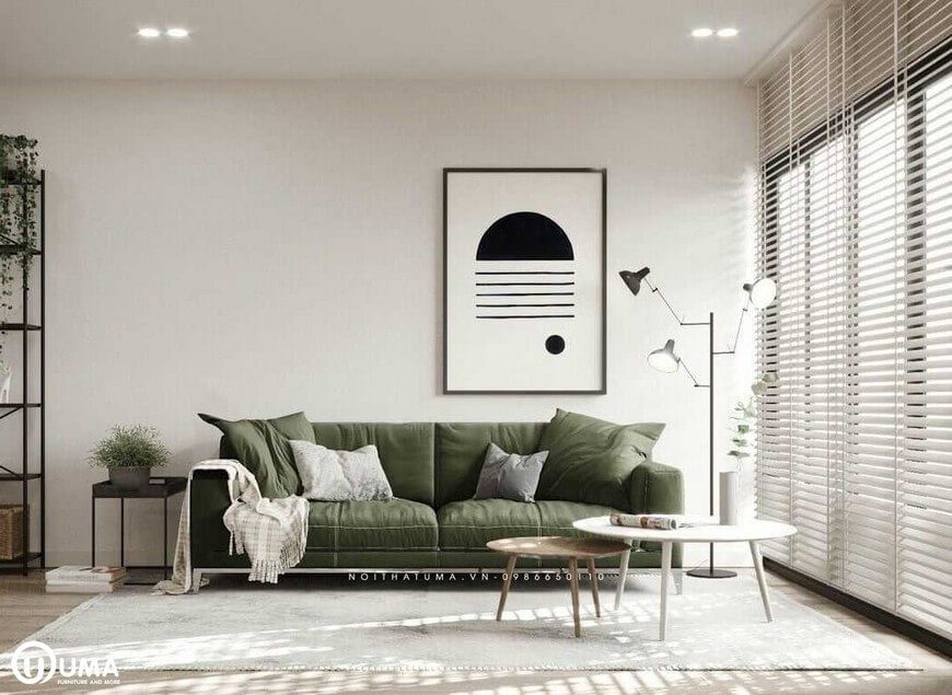 Tại phòng khách với tông màu trắng làm màu chủ đạo của căn phòng. Có điểm nhấn là chiếc ghế sofa màu xanh rêu làm điểm khác biệt tại nơi đây. Với chiếc bàn tròn nhỏ nhắn tiết kiệm diện tích.