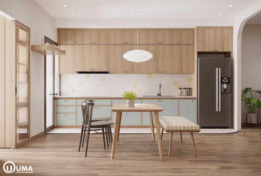 Phòng bếp được thiết kế hình chữ I, với điểm nhấn màu xanh, đã tạo ra màu sắc nổi bật ngay trê tủ bếp