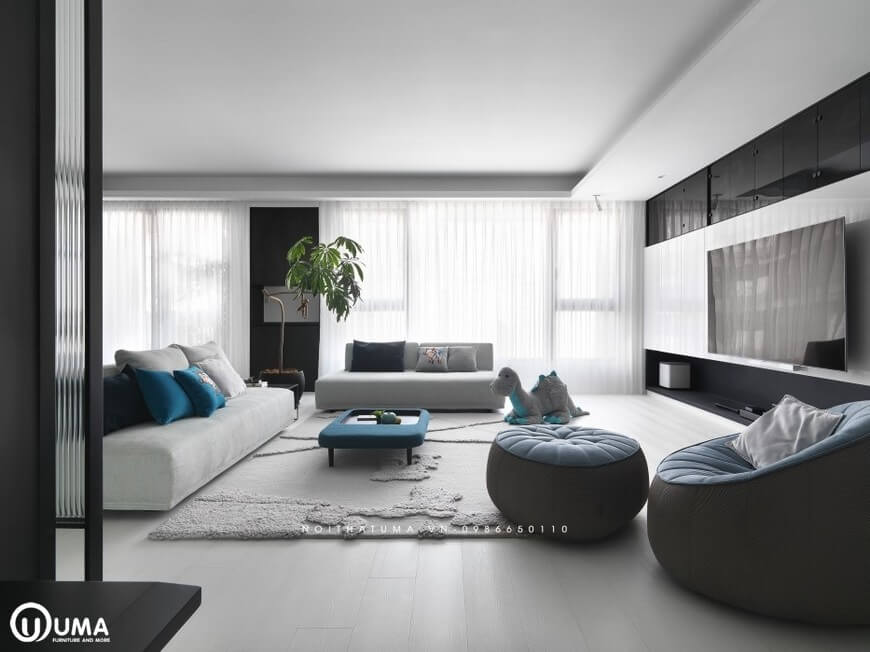 Tổng thể không gian phòng khách được thiết kế khá thân thiện, hài hòa, với bộ sofa nỉ màu trắng sữa