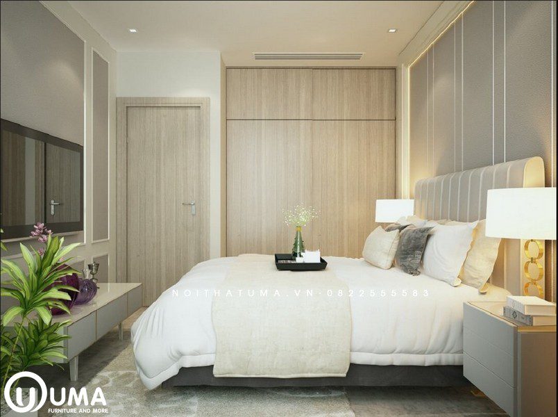 Phòng ngủ được lựa chọn với tông màu chủ đạo là màu trắng của đệm kết hợp với màu xám nhẹ nhàng của không gian phòng ngủ.