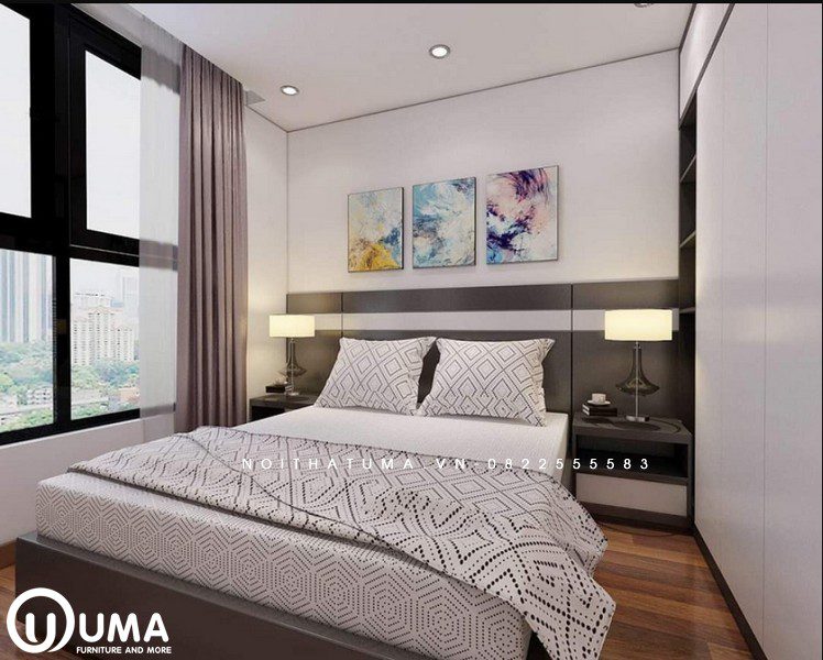 Chiếc giường hộp đặt giữa phòng, với táp đầu giường được thiết kế cùng màu sắc xám tạo ra điểm nhấn cho nơi đây.